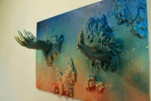 Greek Miracle — painted relief; built up in heavy, tactile impasto; in spray paint; orange, green and blue tones — detail, close-up of surface texture
