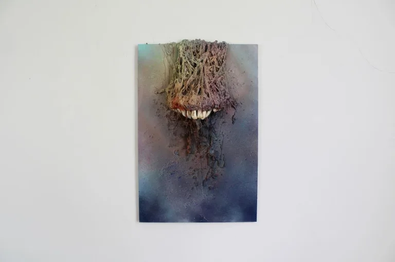 Infinite Jest — painted relief; built up in heavy, tactile impasto; in spray paint; yellow and blue tones