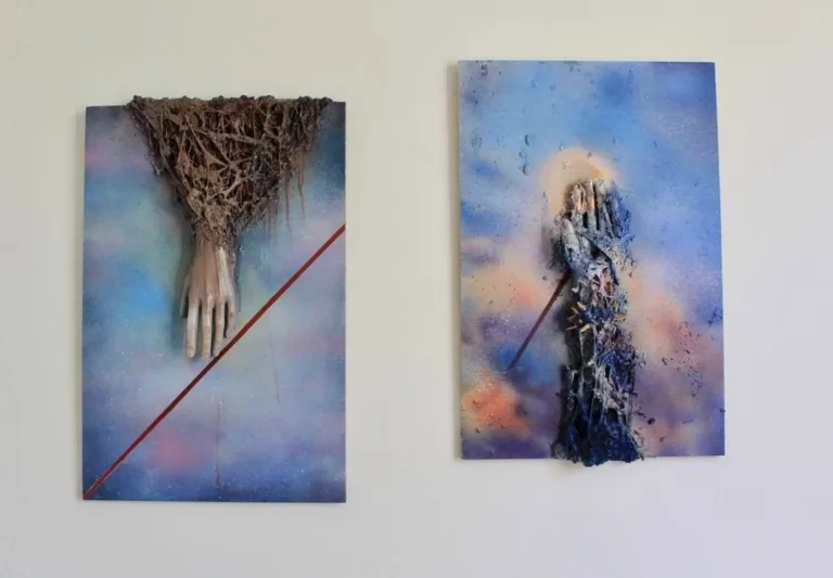 Man Hand And God Hand — painted relief; of a single figure; in spray paint; orange and blue tones