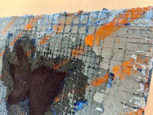 Physical Pixel Layered Hole Blue With Orange Stripes — painting; structured on a grid; in oil on canvas; black tones — detail 2 of 3, close-up of surface texture