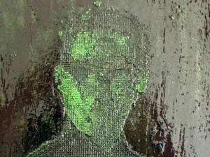 Physical Pixel Portrait Neo Matrix — painting; structured on a grid; in oil on canvas; green and black tones — detail 2 of 3, close-up of surface texture