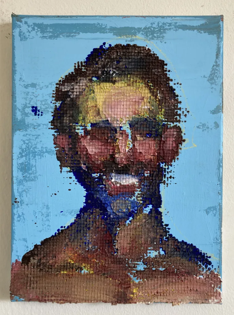 Physical Pixel Portrait Of A Man Smiling On Blue Background