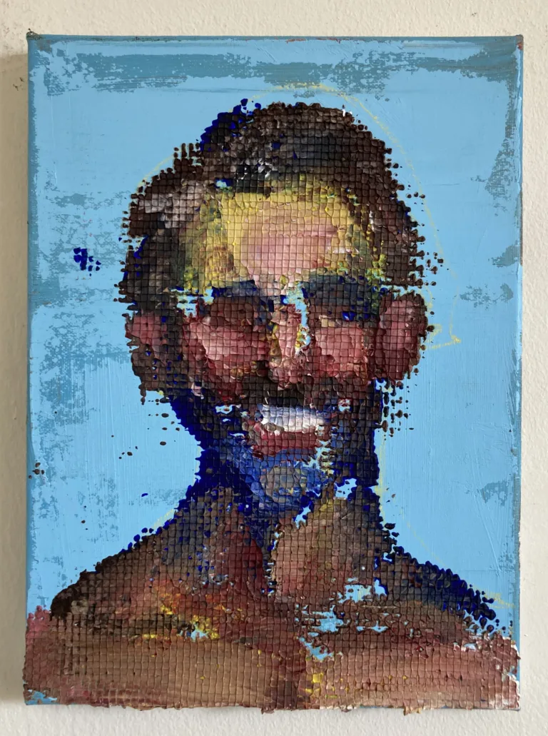 Physical Pixel Portrait Of A Man Smiling On Blue Background — grid-based oil-and-wax portrait; a smiling man built from raised square pixels of brown, pink and yellow paint on pale blue