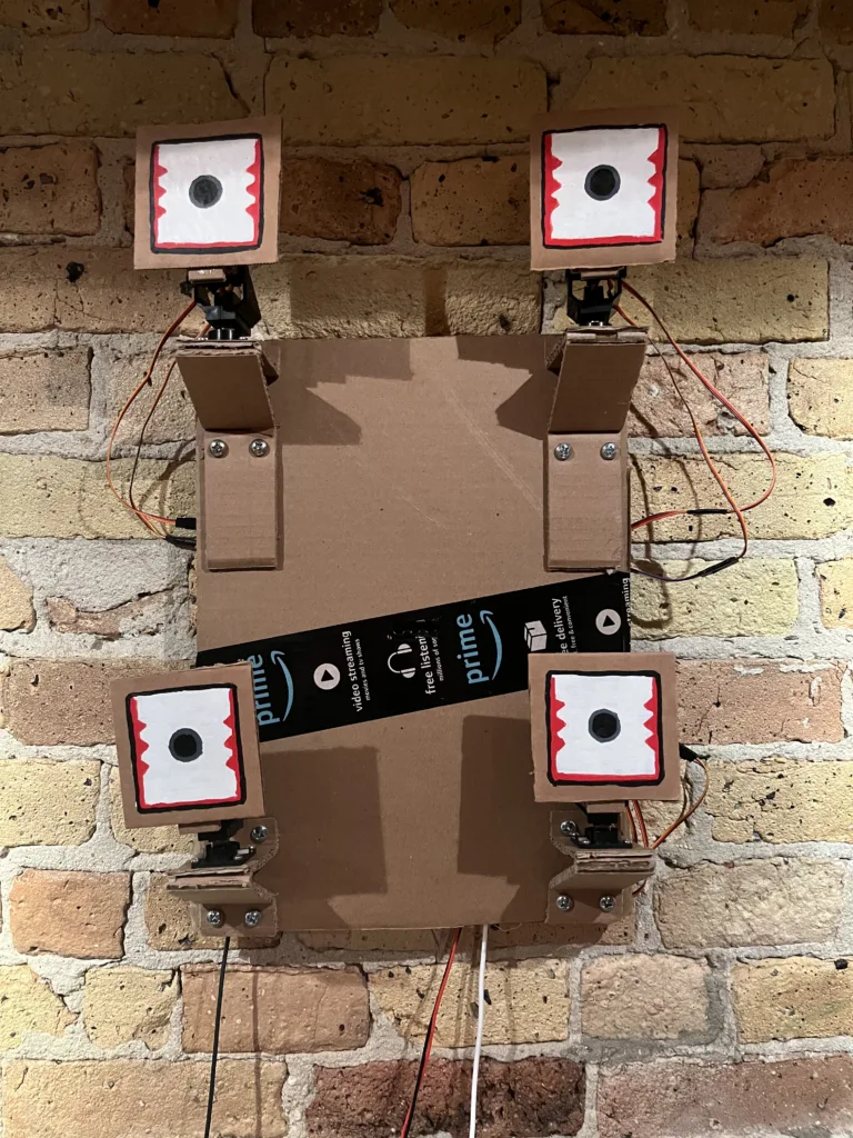 Smile Youre On Camera Kinetic Responsive Surveillance Sculpture