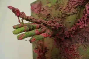 Space Swamp — painted relief; of a landscape; built up in heavy, tactile impasto; in spray paint; green and pink tones — detail 1 of 2, close-up of surface texture