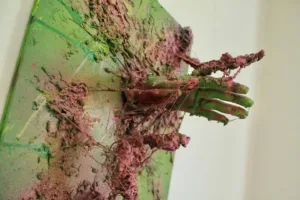 Space Swamp — painted relief; of a landscape; built up in heavy, tactile impasto; in spray paint; green and pink tones — detail 2 of 2, close-up of surface texture
