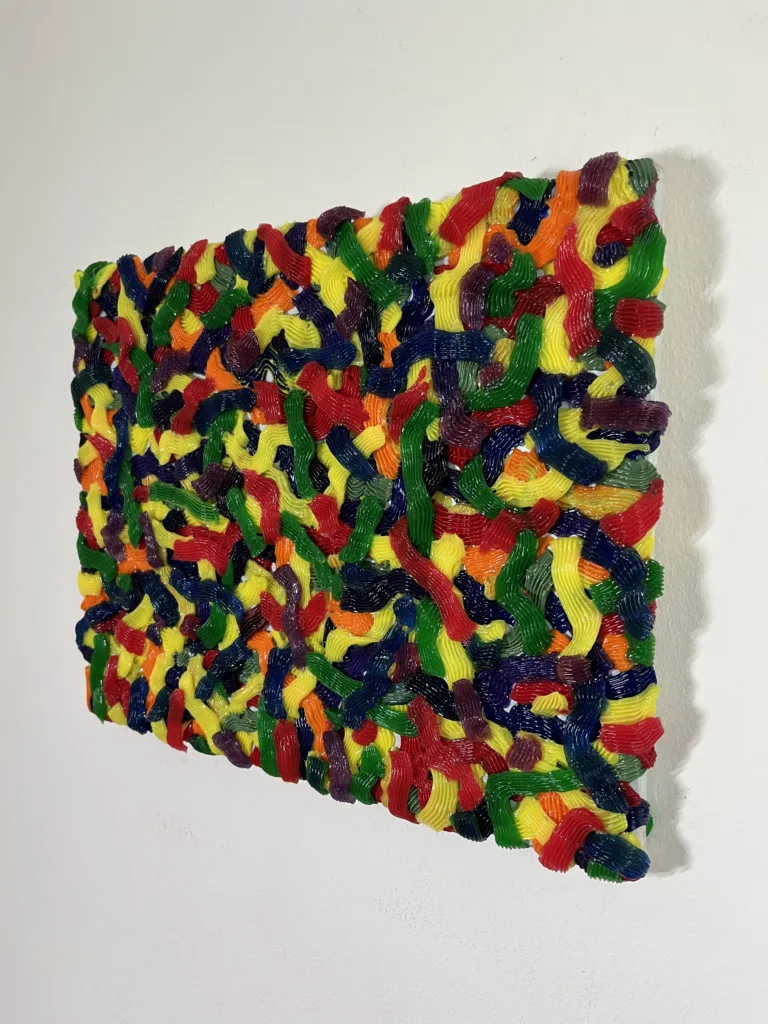 Tactile Candy Relief Squeeze 1 — abstract acrylic-and-gel relief; interlocking piped ribbons of red, yellow, green, blue, purple and orange covering the canvas edge to edge