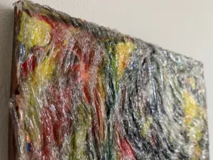 Tactile Squeeze Transparent Abstraction — painting; in acrylic on canvas; red and yellow tones — detail 1 of 3, close-up of surface texture