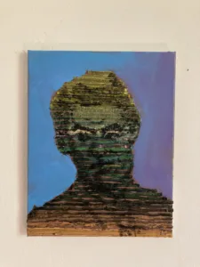 Tactile Textured Linear Squeeze Portrait Of A Man — oil-and-wax relief portrait; a head built from stacked horizontal ridges in green, yellow and brown against blue and violet — detail 3 of 4, close-up of surface texture
