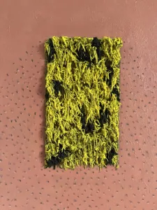 Tactile Textured Squeeze Mohawk — abstract oil-and-wax relief; a dense rectangle of yellow and black piped strands on a dotted rose-brown ground — detail 5 of 5, close-up of surface texture
