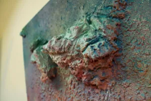 The Fall — painted relief; built up in heavy, tactile impasto; in spray paint; green and pink tones — detail 1 of 2, close-up of surface texture