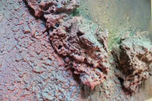 The Fall — painted relief; built up in heavy, tactile impasto; in spray paint; green and pink tones — detail 2 of 2, close-up of surface texture