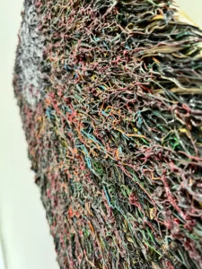 The Network Is The Computer Tactile Squeeze — painting; of an object; in oil on canvas; brown and white tones — detail 1 of 3, close-up of surface texture