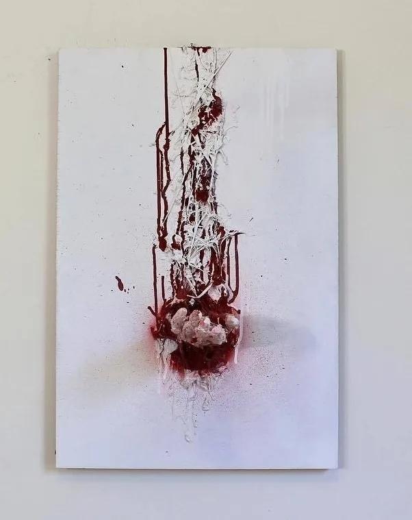 Youre Back — painted relief; of a single figure; built up in heavy, tactile impasto; in spray paint; red and white tones